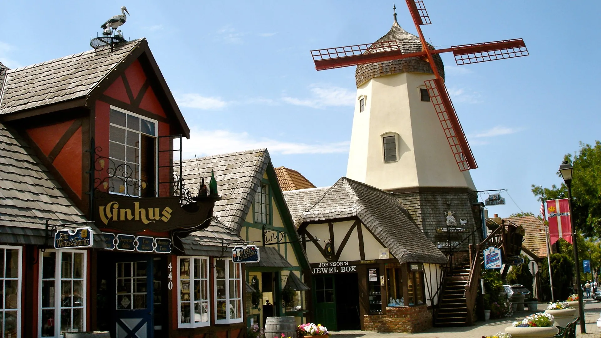 Solvang windmill and Danish-style shops in downtown, service area for Plumber in Solvang, CA.